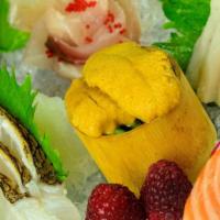 Sashimi Combination · 16 slices chef's choice of assorted raw fresh fish.