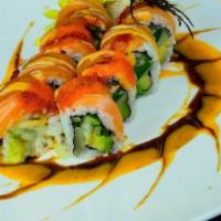Super Volcano Roll · Spicy tuna, shrimp and avocado deep fried; topped with baked king crab, assorted fish, octop...