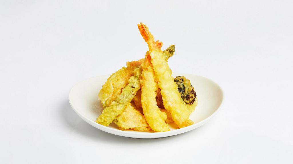 Shrimp Tempura · Shrimp and vegetables fried in tempura batter and served with a tempura dipping sauce.