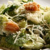 Caesar · Crisp Romaine lettuce with Parmesan cheese, garlic croutons, and creamy Caesar dressing.