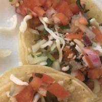 Tacos (Each) · Delicious house tacos with onion cilantro and salsa.