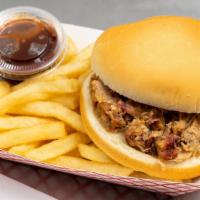 Bbq Sandwich Combo · Our large BBQ sandwich is made on a bun and comes with pickles on it.

The combo comes with ...