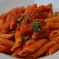 Pink Vodka Penne · Authentic homemade vodka pink sauce on penne pasta.
