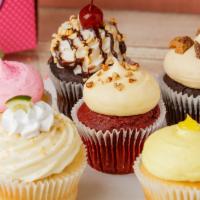 6 Jumbo Cupcakes · Assorted flavors