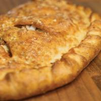 Build Your Own Calzone · Stuffed with up to five toppings of your choice and or signature three cheeses; served with ...