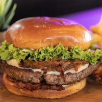 Queso Frito Burger · Meat 6oz, Queso Frito Dices, Caramelized
Onion, Lettuce, Golden Sauce, Includes French Fries!