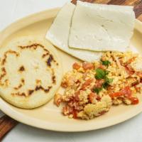Desayuno Criollo / Criollo Breakfast · Dos huevos, carne mechada, frijoles, queso y arepa. / Two eggs, shredded beef, beans, cheese...