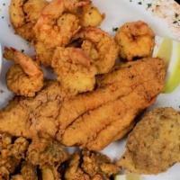 Combo Platter · Farm raised catfish and gulf shrimp with hush puppies and one side.
