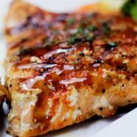 Salmon · Grilled or blackened with your choice of two sides.