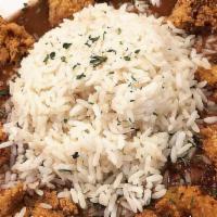 Red Beans & Rice · Served over white rice with your choice of fried chicken, tenders, grilled pork chops or hot...