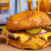 Tmt Doublestack Burger · Two craft Angus beef pattys topped with American, red onion, and sweet b&b pickles. Served w...