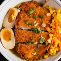 Katsu Curry Ramen · Rich pork and chicken curry broth topped with sautéed cabbage, carrots, corn, chopped spring...