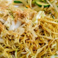 Yakisoba · Japanese sautéed noodles, mixed vegetables in a special sauce and sprinkled with sesame seeds.