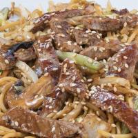 Steak Yakisoba · Japanese sautéed noodles with steak and mixed vegetables in a special sauce and sprinkled wi...