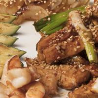 Spicy Hibachi Chicken · Chicken breast grilled with green onions and mushrooms in a special spicy homemade sauce.