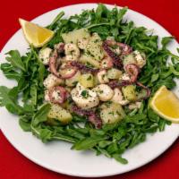 Polipo (Octopus) Alla Griglia · Tender octopus grilled with olive oil, lemon, and parsley.