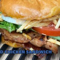 Grilled Chicken Sandwich · Our classic grilled chicken breast topped with 2 strips of bacon, lettuce, tomato, pickles, ...