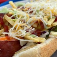 Perro Caliente · Traditional beef frank, shredded cabbage, cheese, and potato sticks with ketchup, mayo, and ...