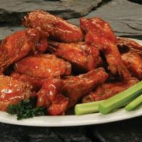 Woody'S Wings 2 Lbs · The flavor takes flight slow-smoked wings, tossed in choice of mild, hot, cajun ranch or Dal...