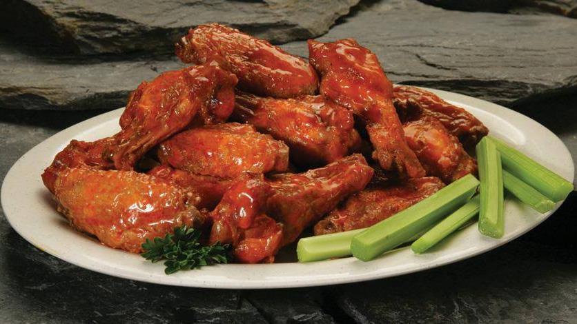 Woody'S Wings 2 Lbs · The flavor takes flight slow-smoked wings, tossed in choice of mild, hot, cajun ranch or Dallas sauce.
