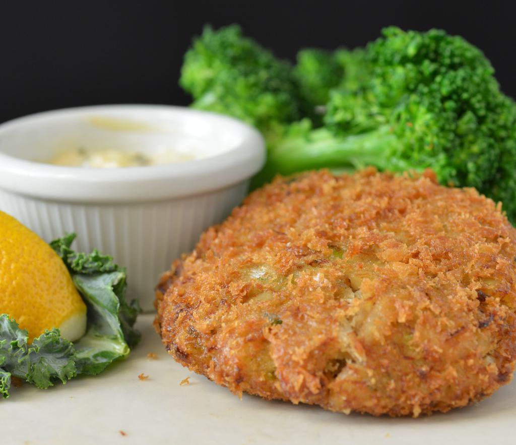 Lch Homemade Blue Crab Cake · One cake lightly breaded and fried golden brown, sugar snap peas
