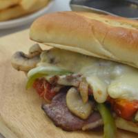 Lch Smoked Brisket Philly · green peppers, onions, mushrooms, roasted tomatoes, provolone, au jus, fries