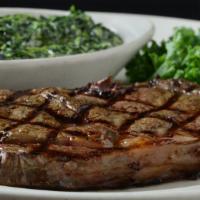 Ribeye · Marbling creates a juicy, flavorful cut of beef; served with loaded baked potato and choice ...