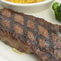 New York Strip (14 Oz) · A large, tender cut from the strip loin; served with loaded baked potato and choice of House...