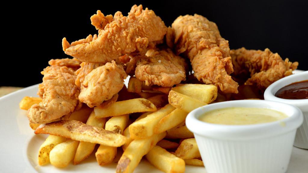 Crispy Chicken Tenders With Chop House Fries · BBQ and honey mustard sauce, fries