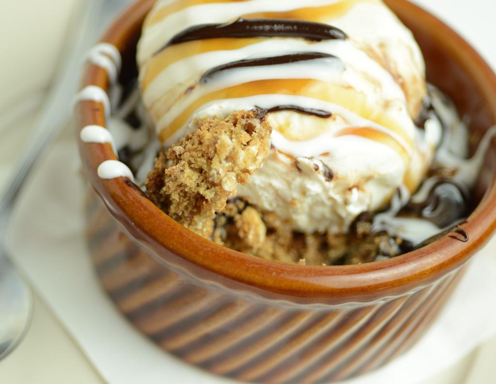 Caramel Cookie Crunch · Freshly baked caramel cookie (contains nuts), homemade Vanilla Bean ice cream, chocolate, caramel, and white chocolate sauces