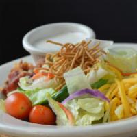 House Salad · Grape tomatoes, jack cheese, cheddar cheese, bacon, cucumbers, rice noodles; served with cho...