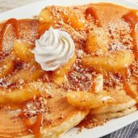 Apple Streusel Pancake · Two thick and fluffy Sweet Cakes® topped with premium apples, cinnamon crunch streusel, swee...