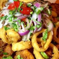 Seafood Varadero · Crispy, shrimp, calamari, fish, octopus and mussels with fried yucca and tartar sauce.