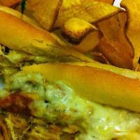 Chicken Vaca Frita Sandwich · With melted mozzarella cheese and grilled onions in French bread.