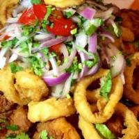 Seafood Varadero · Crispy, shrimp, calamari, fish, octopus and mussels with fried yucca and tartar sauce.