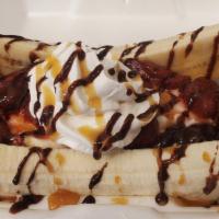 Banana Split  · 2 Scoop Vanilla ice cream with hot fudge , strawberries, whip cream, Hersey's chocolate syru...