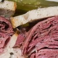 Corned Beef · House smoked corned beef with spicy mustard and pickles on your choice of bread.
