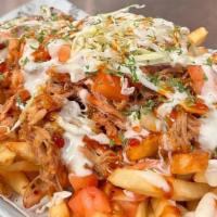 K Pop · Korean bbq , ranch, pulled pork, onion, tomato, cabbage and cheddar cheese over French fries
