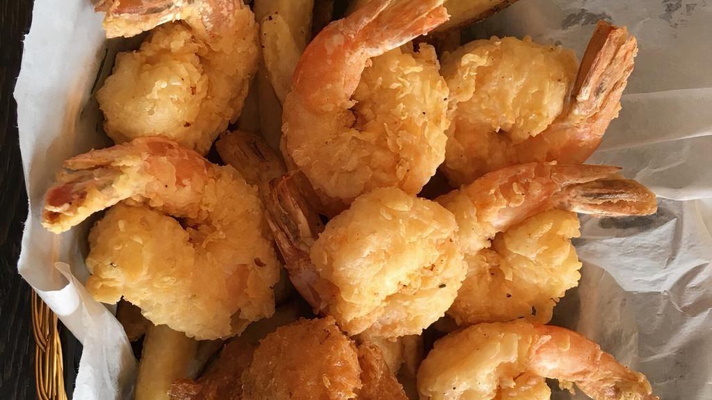 Fried Shrimp Basket · Our signature fried shrimp served with cocktail & tartar sauce. Served alongside choice of side.