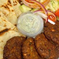 B13-Falafel · Fried ground chickpeas with herbs, served with tzatziki and pita bread.