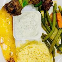 H3-Lamb Shish Kabob · With tomatoes, peppers and onions, served with Greek lemon potatoes.