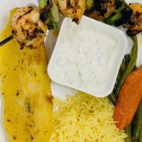 H4-Shrimp Shish Kabob · With tomatoes, peppers and onions, served with Greek lemon potatoes.