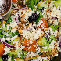 C2-Traditional Greek Salad · Romaine lettuce, sliced tomatoes, cucumbers, onions, kalamata olives, feta cheese, pepperonc...