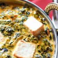 Saag Paneer · Chopped ‘saag’ (spinach) prepared in a delightfully light cream sauce with cubed ‘paneer’ (c...