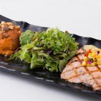 Grilled Salmon Entree · Roasted Corn Relish, Baby Greens, Your choice of: Fresh Coconut Curry Sauce OR Black Bean Or...
