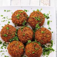 Falafel · Deep fried ground chickpeas mixed with fine herbs and spices. Served with tahini sauce.