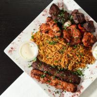 Mixed Grill · A delicious combination of chicken & beef kafta kabab and chicken & beef shish kabob.