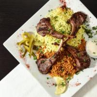 Lamb Chops · Four pieces of lamb chops seasoned in our chef's blend of unique seasonings and chargrilled ...