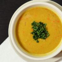 Lentil Soup · A blend of orange lentils sautéed in traditional spices.