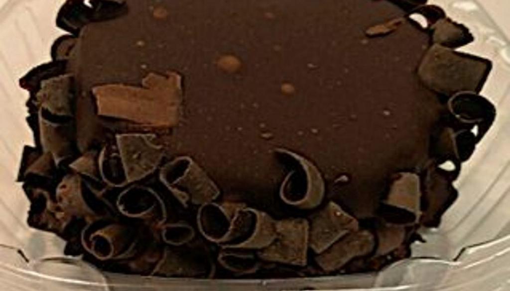 Chocolate Cake  · Chocolate cake topped with chocolate frosting and dark chocolate shavings.   (Single serve)